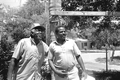 Street singer Tom Walton with apprentice James Watson - Saint Petersburg, Florida.