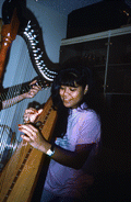 Cecilia Santos plays Venezuelan harp- Miami, Florida