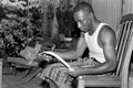 Alphonso Jennings splitting white oak in order to make a basket - Lamont, Florida