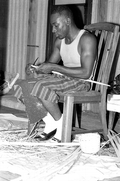 Alphonso Jennings splitting white oak in order to make a basket - Lamont, Florida