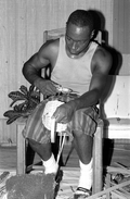 Alphonso Jennings working on a white oak basket - Lamont, Florida