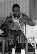 Alphonso Jennings splitting white oak in order to make a basket - Lamont, Florida