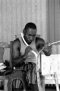 Alphonso Jennings splitting white oak into strips to make a basket - Lamont, Florida