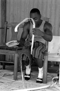 Alphonso Jennings splitting white oak into strips to make a basket - Lamont, Florida