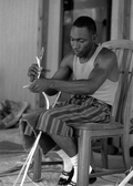 Alphonso Jennings splitting white oak into strips to make a basket - Lamont, Florida