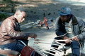 Apprentice Michael Steen (R) watches teacher Alphonso Jennings make a white oak basket - Lamont, Florida