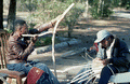 Apprentice Michael Steen (R) making a white oak basket as teacher Alphonso Jennings cuts white oak into strips - Lamont, Florida