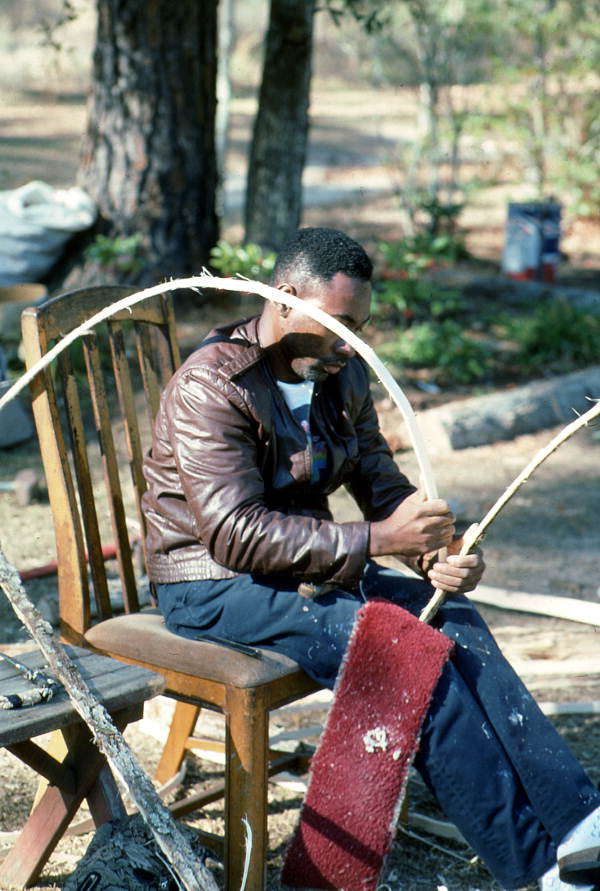 Alphonso Jennings stripping a white oak tree in order to make baskets - Lamont, Florida