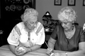Ukrainian Easter egg decorator Ola Kryway (L) watches as apprentice Mary Martin applies wax to an egg - Titusville, Florida.