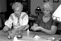 Ola Kryway (L) and apprentice Mary Martin decorating eggs using the Ukrainian pysanky technique - Titusville, Florida.