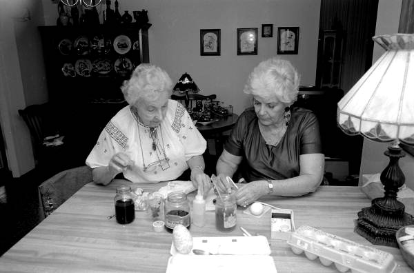 Ola Kryway (L) and apprentice Mary Martin decorating eggs using the Ukrainian pysanky technique - Titusville, Florida.
