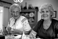 Ola Kryway (L) and apprentice Mary Martin decorating Easter eggs with the Ukrainian pysanky technique - Titusville, Florida.