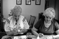 Ola Kryway (L) and apprentice Mary Martin decorating Easter eggs using the Ukrainian pysanky technique - Titusville, Florida.
