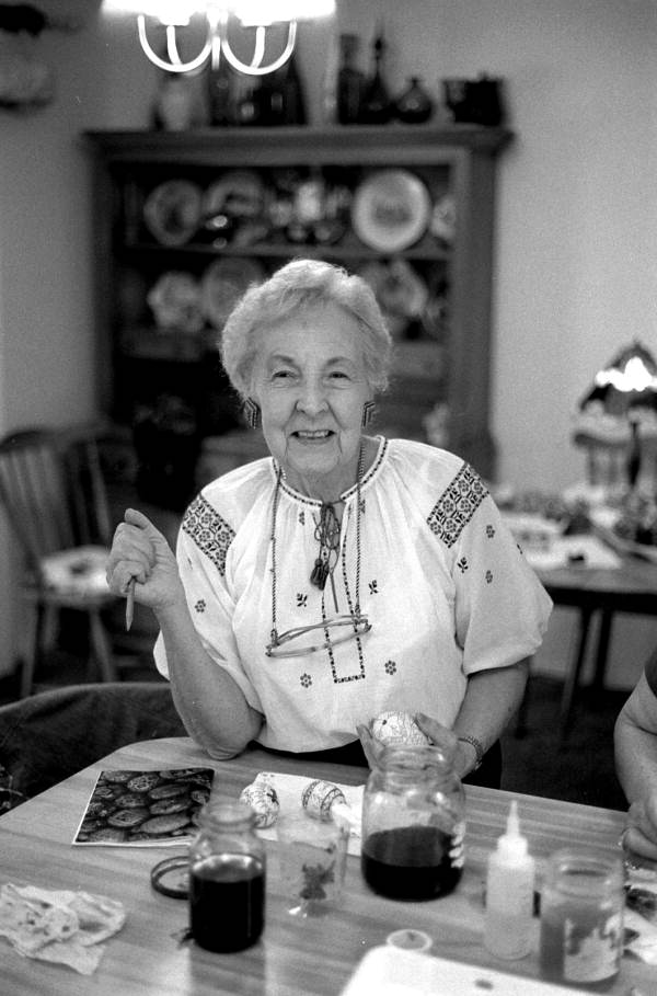 Ola Kryway pauses from decorating Easter eggs using the Ukrainian pysanky technique - Titusville, Florida.