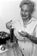 Ola Kryway using a kystka to apply melted beeswax to an Easter egg - Titusville, Florida.
