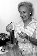 Ola Kryway using a kystka to apply melted beeswax to an Easter egg - Titusville, Florida.