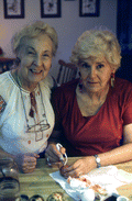 Ola Kryway (L) and apprentice Mary Martin pause from decorating Easter eggs - Titusville, Florida.