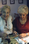 Ola Kryway (L) and apprentice Mary Martin decorating Easter eggs - Titusville, Florida.