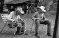 Cow whip maker George "Junior" Mills (l) and his apprentice J. Taylor Marcus working - Okeechobee, Florida.