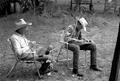 Cow whip maker George "Junior" Mills (l) and his apprentice J. Taylor Marcus working - Okeechobee, Florida.