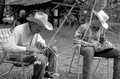 Cow whip maker George "Junior" Mills (l) and his apprentice J. Taylor Marcus working - Okeechobee, Florida.