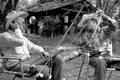 Cow whip maker George "Junior" Mills (l) and his apprentice J. Taylor Marcus at work - Okeechobee, Florida.