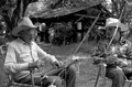 Cow whip maker George "Junior" Mills (l) and his apprentice J. Taylor Marcus at work - Okeechobee, Florida.