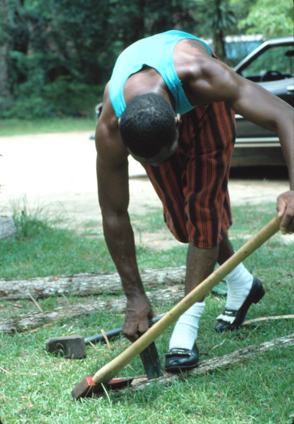 Alphonso Jennings splitting white oak to make a basket - Lamont, Florida