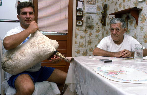 Tsabouna player Nikitas Tsimouris, right, with apprentice and grand-nephew Nikitas Kavouklis - Tarpon Springs, Florida