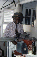 Musician Washboard Bill Cooke playing his washboard - West Palm Beach, Florida.