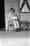 Gamble Rogers with young child at the 1985 Florida Folk Festival - White Springs, Florida