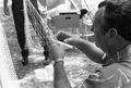 Bobby Smith demonstrating net making at the 1987 Florida Folk Festival - White Springs, Florida