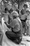 Costa Buzier demonstrating shrimp trawl net making at the 1987 Florida Folk Festival - White Springs, Florida