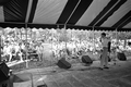 Gamble Rogers telling stories from the old marble stage at the 1987 Florida Folk Festival - White Springs, Florida