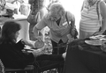Basket maker demonstrating pine needle basketry techniques at the 1988 Florida Folk Festival - White Springs, Florida
