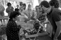 Pam Maneeratana demonstrating Thai fruit and vegetable carving at the 1988 Florida Folk Festival - White Springs, Florida