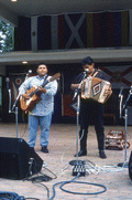 Norteno accordion player Tomas Granado, right, and his apprentice Abraham Arrazola performing at the 1992 Florida Folk Festival - White Springs, Florida.