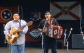 Norteno accordion player Tomas Granado, right, and his apprentice Abraham Arrazola performing at the 1992 Florida Folk Festival - White Springs, Florida.