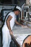 Baker Howard Goren flouring pastry dough - Miami Beach, Florida.