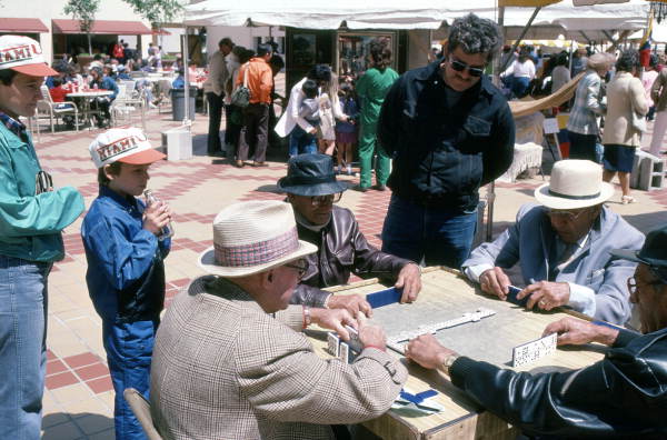 Men playing dominoes at the Traditions Festival - Miami, Florida, 1986