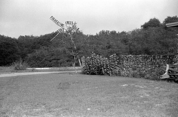 Fence and sign of the Cypress Knee Museum - Palmdale, Florida.