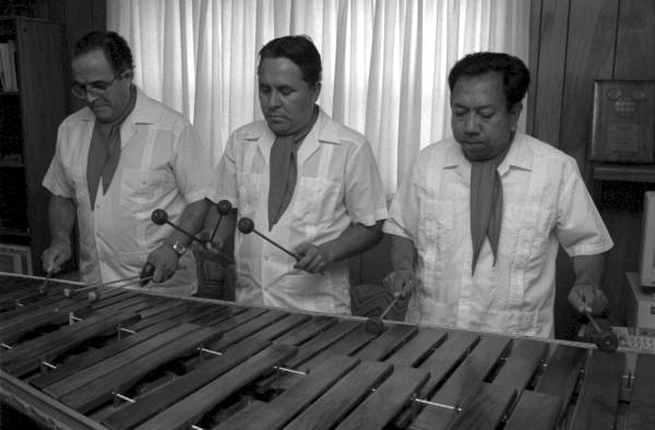 Three of the members of Marimba Mayalandia perform in the Rivera residence - Orlando, Florida