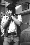Harmonica player Mickey Seretny practicing before concert at The Stuffed Pepper - Saint Petersburg, Florida.