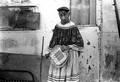 Bert Billie holding a couple of her baskets - Big Cypress Seminole Indian Reservation, Florida