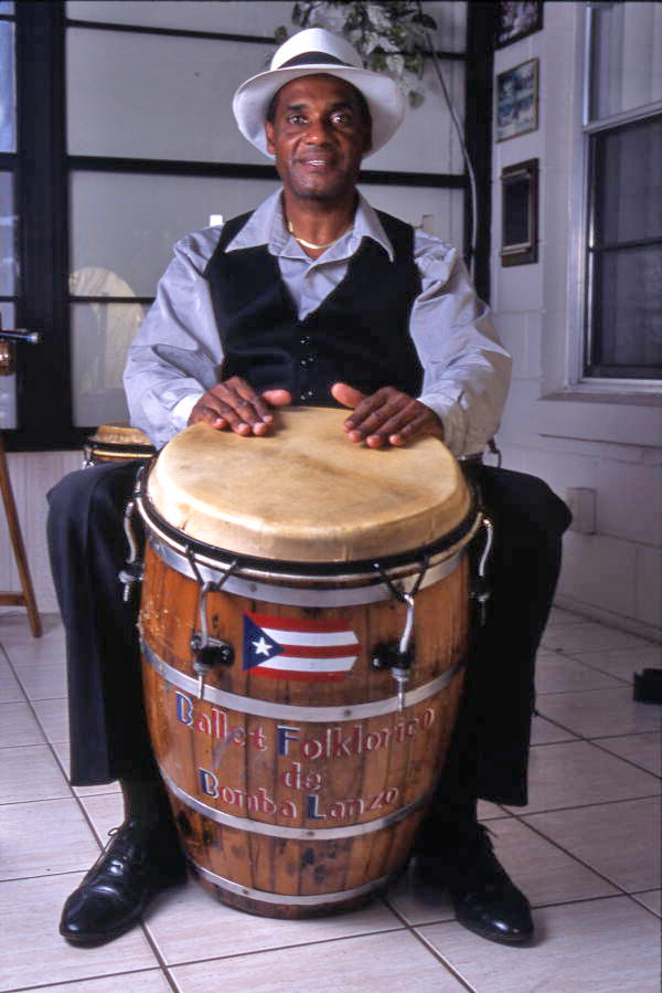 Miguel Lanzo with Puerto Rican musical instruments - Orlando, Florida.