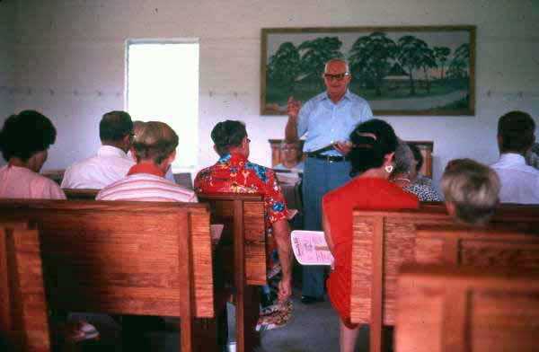 Man leading Sacred Harp singing at the Bethlehem Primitive Baptist Church - Old Chicora, Florida