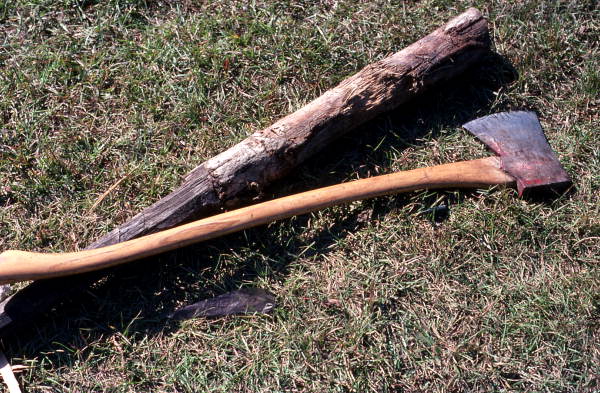 Ax and small piece of white oak used by Lucreaty Clark for basket making