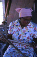 Basket maker Lucreaty Clark holding white oak strips