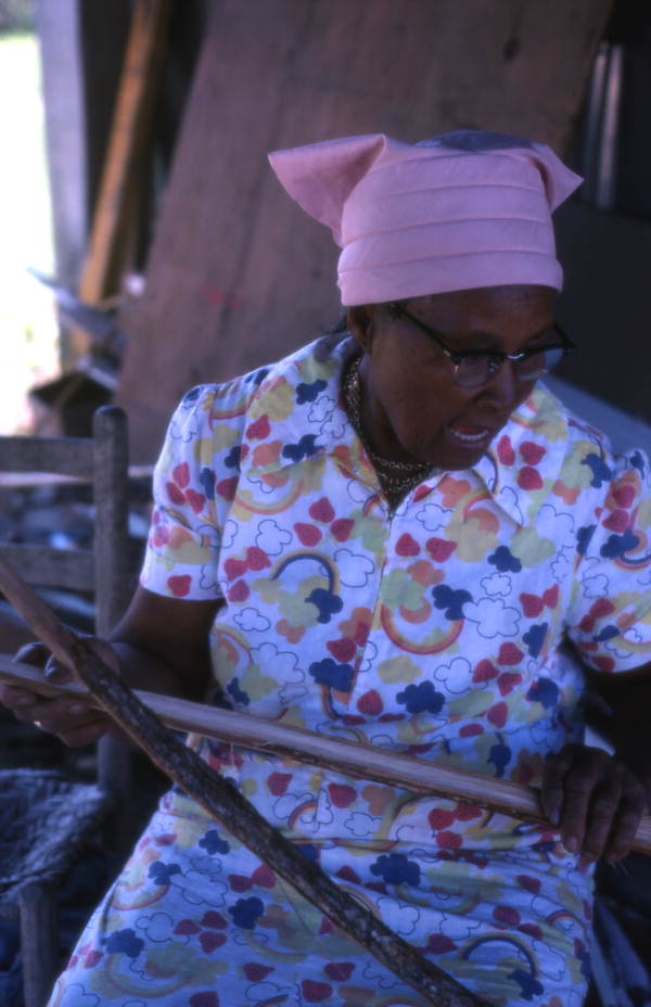 Basket maker Lucreaty Clark holding white oak strips