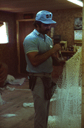 Billy Burbank III weaving a fishing net - Fernandina Beach, Florida